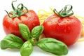 Fresh tomato and basil spaghetti serving on white background, italian cuisine concept Royalty Free Stock Photo