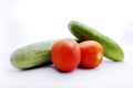 Fresh Tomato and cucumber isolated on white Royalty Free Stock Photo