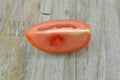 Fresh Tomato cut half on wooden background, decorate Royalty Free Stock Photo