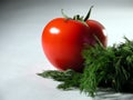Fresh tomato and dill Royalty Free Stock Photo