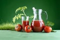 fresh tomato juice on green background of nature Royalty Free Stock Photo