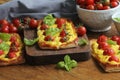 Fresh tomato tart, puff pastry topped with ricotta, cheese and cherry tomatoes Royalty Free Stock Photo