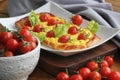 Fresh tomato tart, puff pastry topped with ricotta, cheese and cherry tomatoes Royalty Free Stock Photo