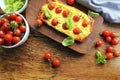 Fresh tomato tart, puff pastry topped with ricotta, cheese and cherry tomatoes. Top view Royalty Free Stock Photo