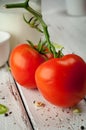 Fresh tomato on wooden table