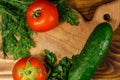 Fresh tomatoes, cucumbers, parsley and dill Royalty Free Stock Photo