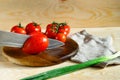 Tomatoes knife kitchen board Royalty Free Stock Photo