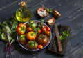 Fresh tomatoes, garden herbs and olive oil