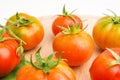 Fresh Tomatoes On Wooden Plate Royalty Free Stock Photo