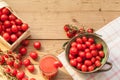 Fresh tomatoes in on an old rustic wooden table Royalty Free Stock Photo