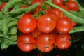 Fresh tomatoes and peas Royalty Free Stock Photo