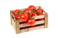 Fresh tomatoes in a wooden crate isolate on a white background Royalty Free Stock Photo