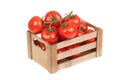 Fresh tomatoes in a wooden crate isolated Royalty Free Stock Photo