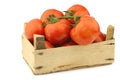 Fresh tomatoes in a wooden crate Royalty Free Stock Photo