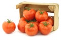 Fresh tomatoes in a wooden crate Royalty Free Stock Photo