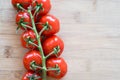 Fresh tomatoes on a wooden desk. Royalty Free Stock Photo