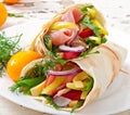 Fresh tortilla wraps with meat and vegetables