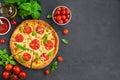 Fresh traditional Italian pizza Margarita or margharita with tomato sauce, mozzarella cheese and fresh green basil on top Royalty Free Stock Photo