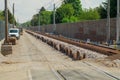 Fresh train track construction, creating lower gravel bed for new and modern tracks. Different tools around the contruction site, Royalty Free Stock Photo