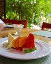 Fresh Tropical Fruit Plate On Outdoor Patio