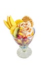 Fresh tropical fruit salad with ice cream Royalty Free Stock Photo