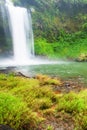 Fresh tropical waterfall on rainy morning Royalty Free Stock Photo