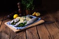 Fresh trout with lemon and different herbs Royalty Free Stock Photo