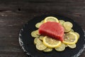 Fresh Tuna Raw Steak on Lemon Slice Royalty Free Stock Photo