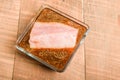 Fresh tuna steak marinating in bowl Royalty Free Stock Photo