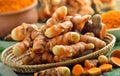 Fresh turmeric roots in the basket on wooden table Royalty Free Stock Photo