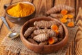 Turmeric roots and powder rustic still life Royalty Free Stock Photo