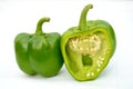 The fresh two half cutt ripe capsicum isolated in white background Royalty Free Stock Photo