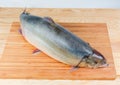 Fresh uncooked arctic char on a wooden cutting board Royalty Free Stock Photo