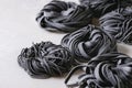 Fresh uncooked black pasta Royalty Free Stock Photo