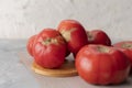 fresh unsightly and ugly home grown tomatoes from the garden at the kitchen isolateds Royalty Free Stock Photo