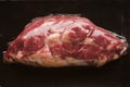 Fresh vacuum packed meat on black background Royalty Free Stock Photo