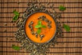 Fresh vegan plate of pumpkin cream soup