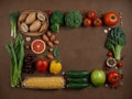 Fresh vegetable and fruit frame isolated on brown background Royalty Free Stock Photo