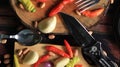 Fresh vegetable ingredients with kitchen utensils ready to cook.
