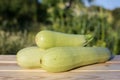 Fresh vegetable marrows on wooden table Royalty Free Stock Photo