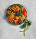 fresh vegetable mix in gray plate top view Royalty Free Stock Photo