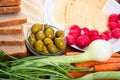 Fresh vegetable, olives, cheese and bread Royalty Free Stock Photo