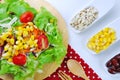 Fresh vegetable salad with corn,carrot,tomato,green oak, Royalty Free Stock Photo