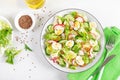 Fresh vegetable salad with cucumber, radish, lettuce and boiled eggs. Helathy food. Top view