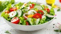 Fresh vegetable salad with cucumbers, tomatoes, onions and lettuce on white table. AI Generated Royalty Free Stock Photo