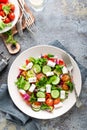 Fresh vegetable salad with feta cheese, fresh lettuce, cherry tomatoes, red onion and pepper Royalty Free Stock Photo