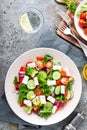 Fresh vegetable salad with feta cheese, fresh lettuce, cherry tomatoes, red onion and pepper Royalty Free Stock Photo