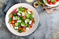 Fresh vegetable salad with feta cheese, fresh lettuce, cherry tomatoes, red onion and pepper Royalty Free Stock Photo