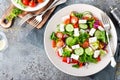 Fresh vegetable salad with feta cheese, fresh lettuce, cherry tomatoes, red onion and pepper Royalty Free Stock Photo