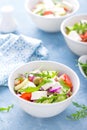 Fresh vegetable salad with feta cheese and olives in white bowl Royalty Free Stock Photo